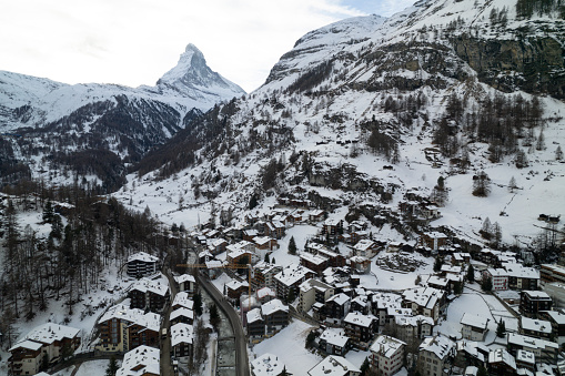 Aerial view of snow covered, Swiss mountain village in winter