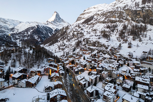 Aerial view of snow covered, Swiss mountain village in winter