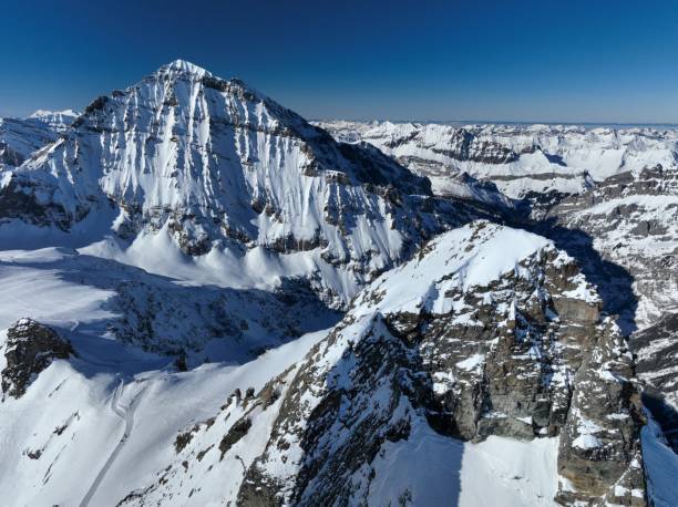 istock Aerial view of snowcapped mountains 1950370137
