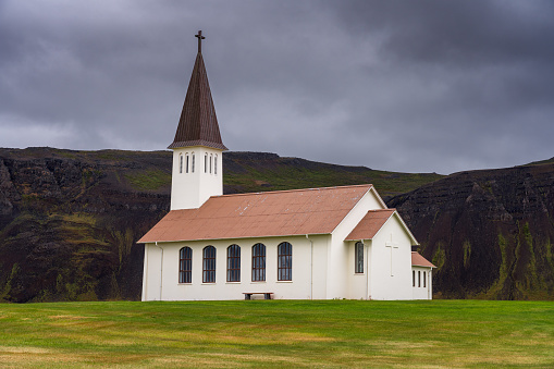 View of Reykhólar church. Small village Reykhólar is located in south of Westfjords, Iceland. Excellent birch watching location and geothermal area.