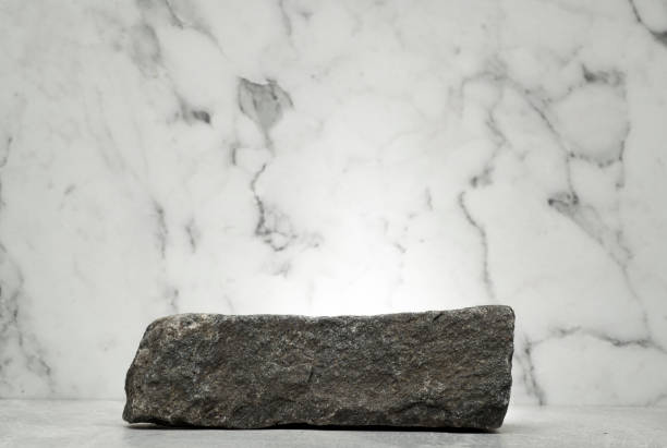 istock stones on a marble background for the podium 1950448737