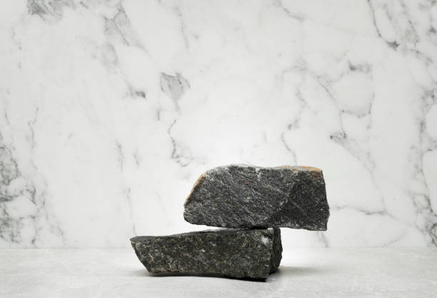 istock stones on a marble background for the podium 1950448746
