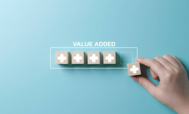 istock Value add concept. Hand place wooden cube with plus sign on light blue background. Positive thinking or personal growth and development. download style which means value added. value add for business. 1950455060
