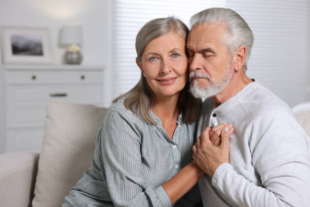 istock Portrait of affectionate senior couple at home, space for text 1950463004