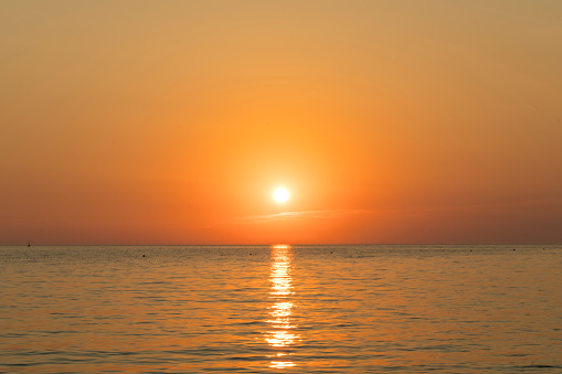 Very intensive orange romantic sunset at the seaside. Dalmatia region. Croatia