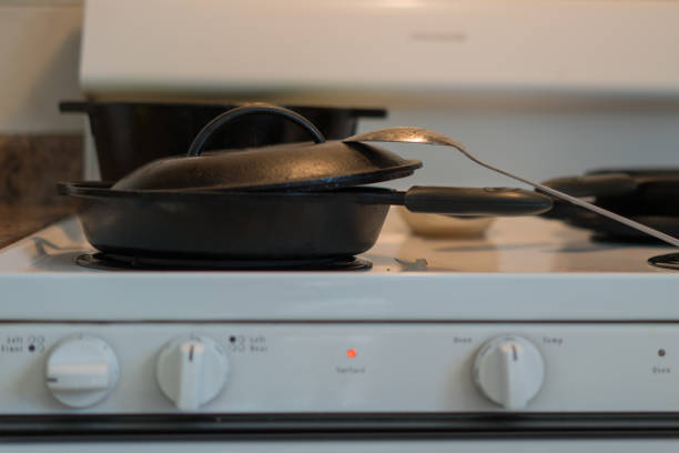 Black iron pan isolated on white background.