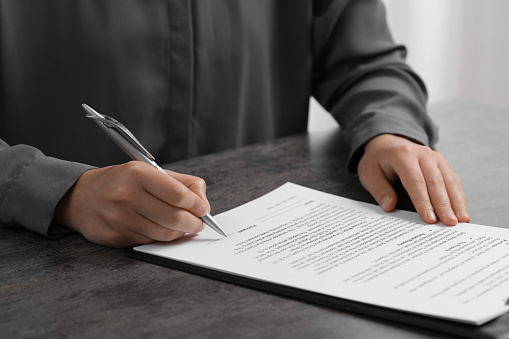 Businessman Signing Contract In The Office