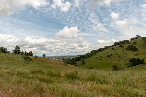 The Lagoon Valley Park in Vacaville, California, USA, from up the mountain on a partly cloudy day and blue sky copy-space