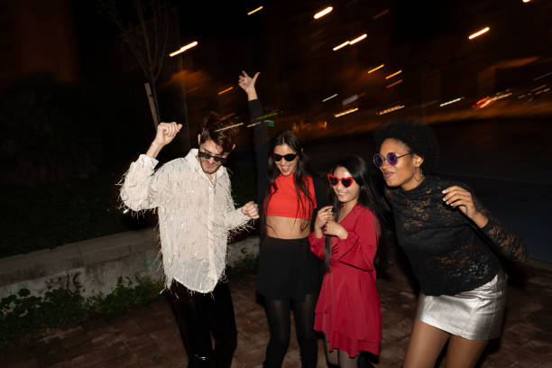 istock Playful Urban Night Gathering Among Friends 1950614240