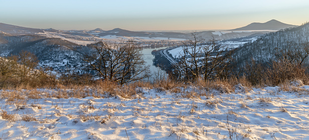 Winter view for valley of river Labe in frosty snowy landscape mountains