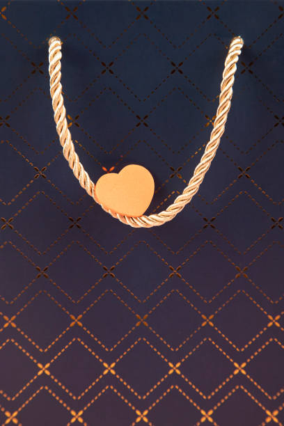 Heart on handle of shopping bag