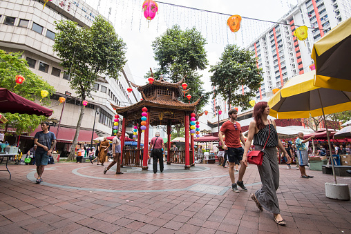 Singapore City, Singapore-September 08,2023 : Street view of local people in their morning routines around the market in Singapore city.