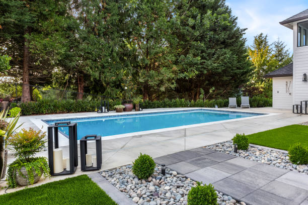 Swimming pool in backyard exterior of extraordinary luxury home stock photo