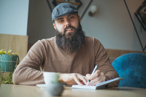istock portrait of a handsome young writer 1950748726