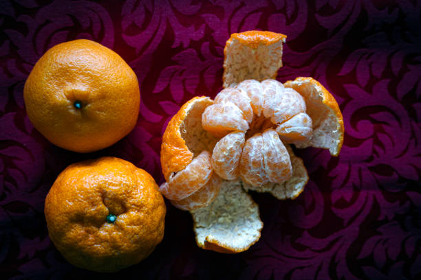 Mandarin Orange is one of the common Chinese New Year food gifts. It is believed that it brings good luck and happiness. It looks like the sun, doesn't it ? Also the color symbolizes prosperity and abundance. Are you going to eat Mandarin Oranges ?