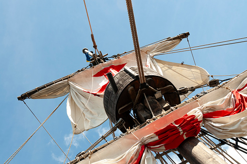 Detail of mast's ship on a sunny day with blue sky.