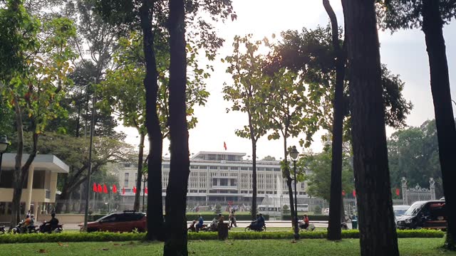 Time lapse Independence palace at Ho Chi Minh city view from park