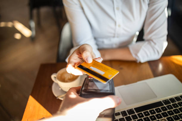 istock An unrecognizable person paying contactless with a credit card 1950900945