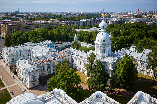 Panoramic top view of Saint Petersburg and part of the architectural ensemble of the Smolny Monastery from bell loft observation deck of Smolny cathedral. Saint Petersburg. Russia.