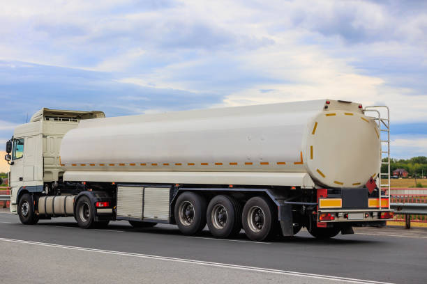 fuel truck transports fuel - truck fuel tanker semi truck milk tanker stock-fotos und bilder