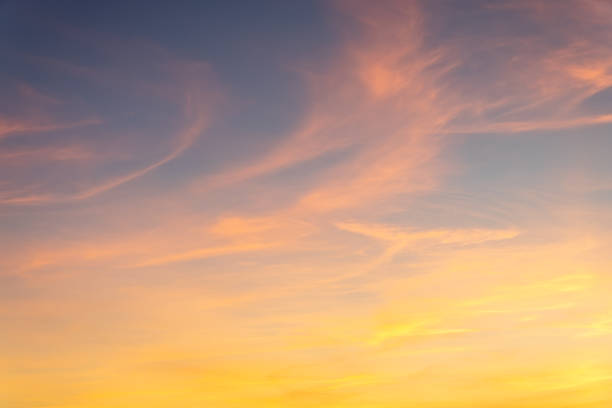 istock Blue-orange sunset on the cloudy sky. Nature texture. 1950938412