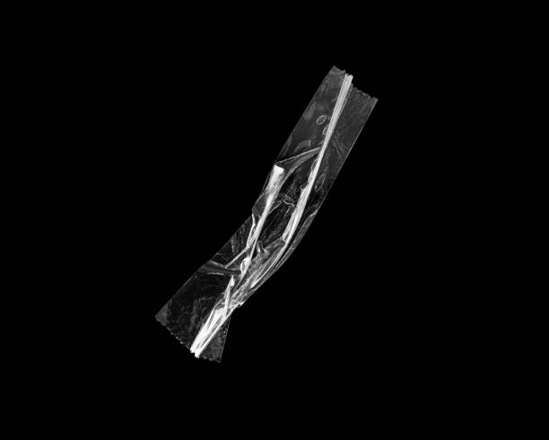 istock adhesive plastic tape isolated on black background 1951036426