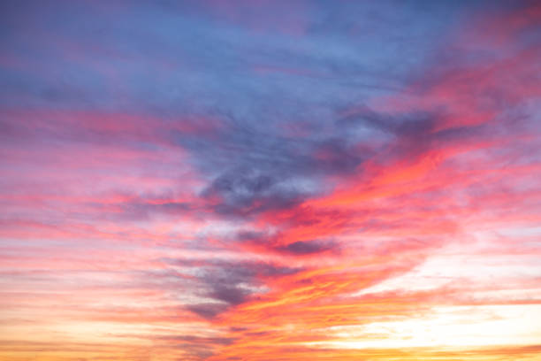 istock Beautiful , luxury Colorful soft gradient mix orange gold red and blue clouds with amezing line sunlight sky, perfect sky for the background, take in everning,Twilight, sky is about to form storm 1951042131