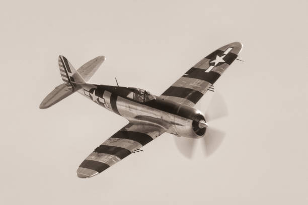 istock P-47G Thunderbolt (WWII American fighter plane)  with its “Invasion Stripes”, in epic light 1951081350
