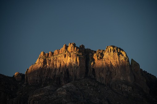 Sunlight Fades Down the Edge of Crown Peak in Big Bend National Park
