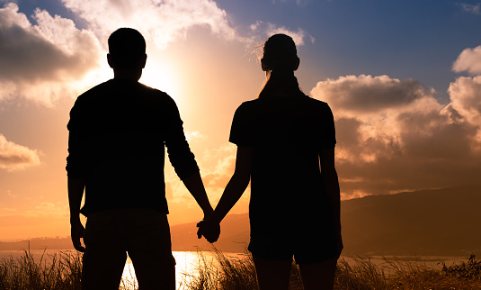 ANKARA salt lake (Tuz gölü) , lovers in love holding hands at sunset with beautiful sky