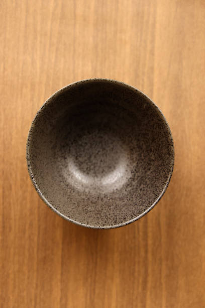 istock beautiful wooden table and bowl 1951153756