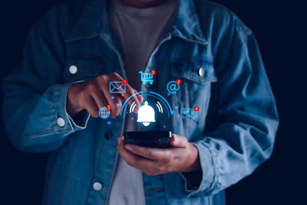 istock Application notification alert concept. Business people using smartphone with virtual bell ringing, New email, digital marketing, electronic message alert, online shopping connect via internet network 1951230024