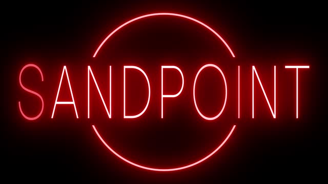 Glowing and blinking red retro neon sign for SANDPOINT