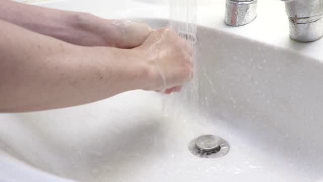 wash hands in the washbasin