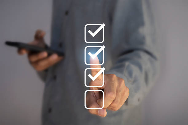istock Businessman makes check mark in square box, concept of quality inspection, selection, approval of documents and projects. 1951384457