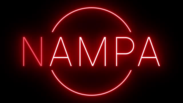 Glowing and blinking red retro neon sign for NAMPA
