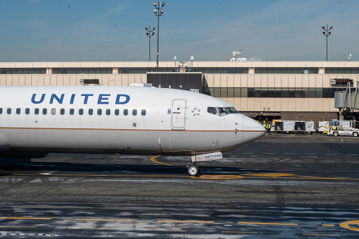 March 1, 2023 - Newark, New Jersey - United Airlines Jet pulling out onto the Taxiway at Newark Liberty Airport EWR for a day of flying