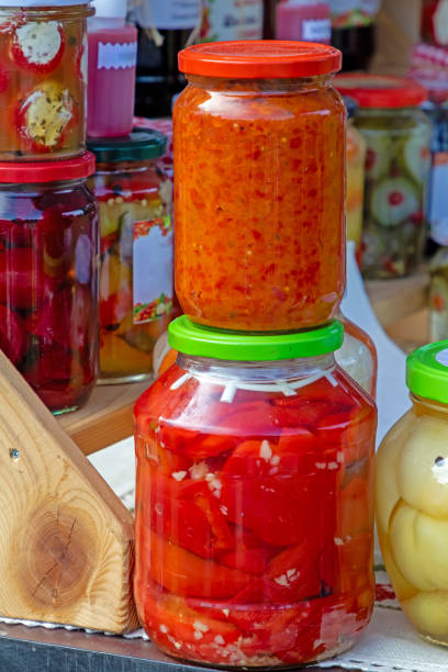 istock Preserved vegetables sold in jars on market 1951456285
