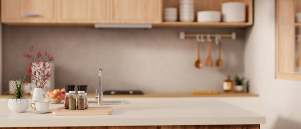istock A copy space on a modern kitchen island with seasoning bottles in a modern, Scandinavian kitchen. 1951512409