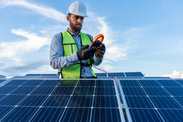 istock engineer technician checking output voltage level of inverter on solar panels 1951513776