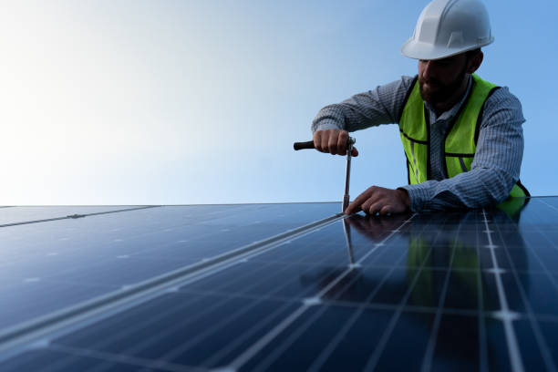 istock low angle portrait of a confident engineer looking at camera, technician standing between solar panels, concept of a professional on renewable energy posing with confidence 1951513949