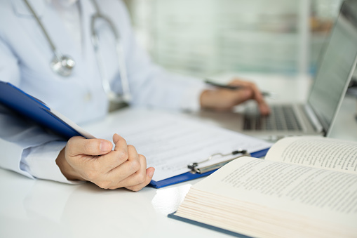 medical communicator or medical writer are writing clinical trial documents that describe research results, product use, and other medical information.