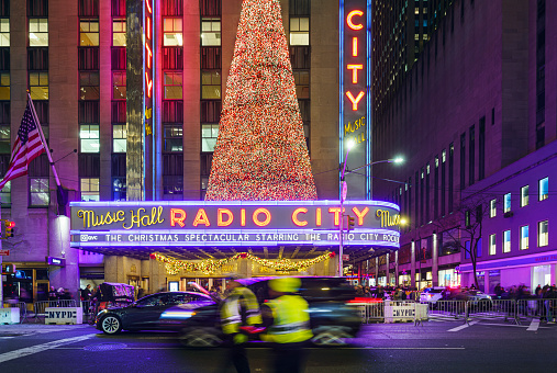 New York City, New York, USA - December 01, 2023: Night shot of the Radio City Music Hall. Which is one of the most famous theaters in the world is an entertainment venue located in New York City's Rockefeller Center.
