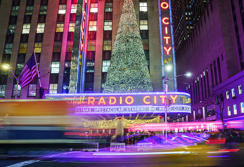 New York City, New York, USA - December 01, 2023: Night shot of the Radio City Music Hall. Which is one of the most famous theaters in the world is an entertainment venue located in New York City's Rockefeller Center.