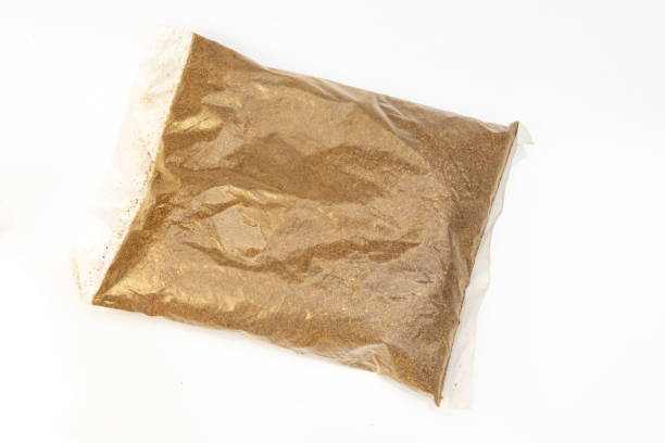 istock Neem cake powder fertilizer on white background 1951611004