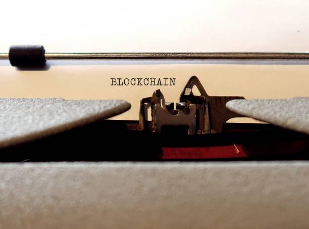 istock Old Vintage typewriter with text BLOCKCHAIN means technology system of recording information that makes it impossible to change, hack or cheat - enables the existence of cryptocurrency 1951617225