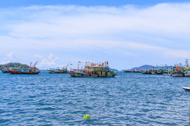 istock Fishing Boats Floating Peacefully on a Sunny Day 1951645910
