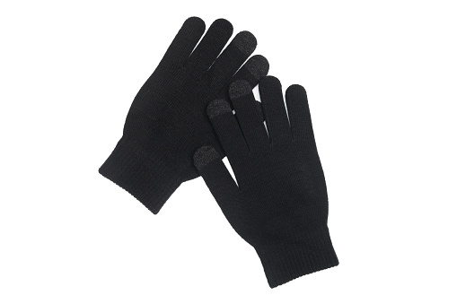 pair of black gloves on white background