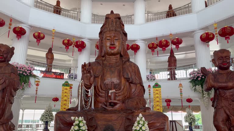 Large carved wooden goddess Kuan Yin