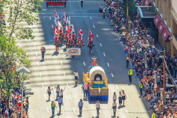 Calgary, Alberta, Canada. Jul 10, 2023. An aerial perspective capturing the Calgary Stampede Parade in Downtown Calgary.